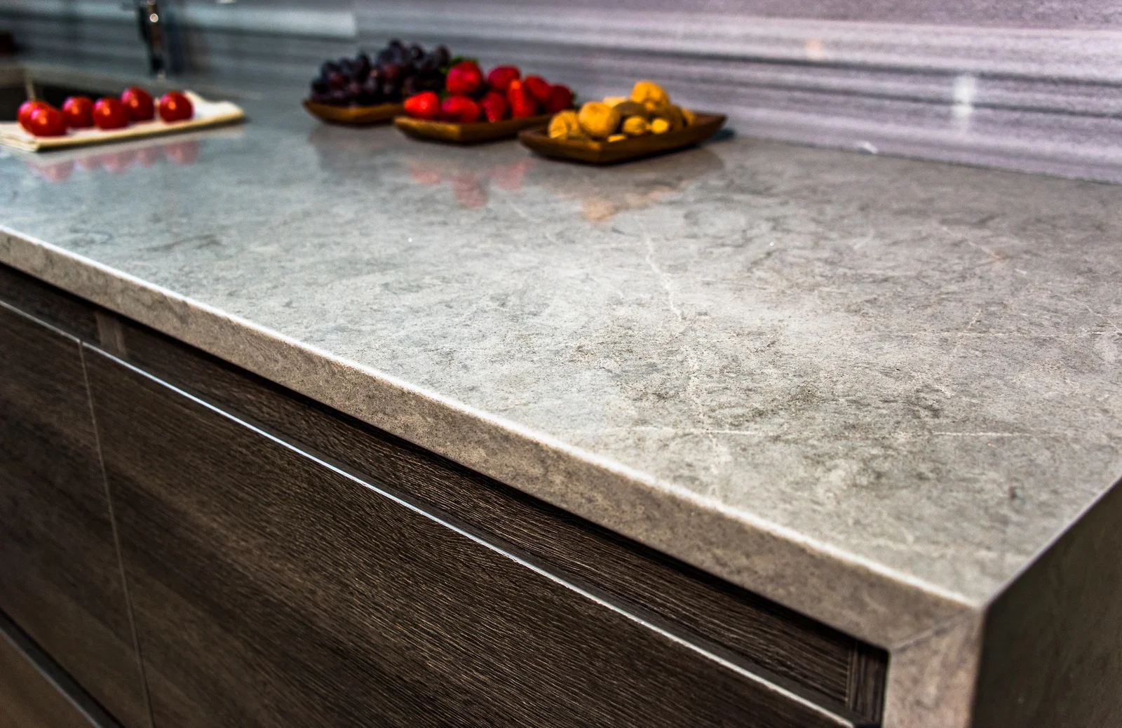 granite countertops on dark brown cabinets